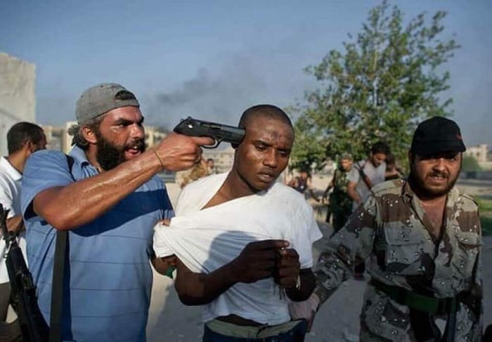 Сжигая людей заживо, боевики из Триполи наводят ужас на рабочих-мигрантов
